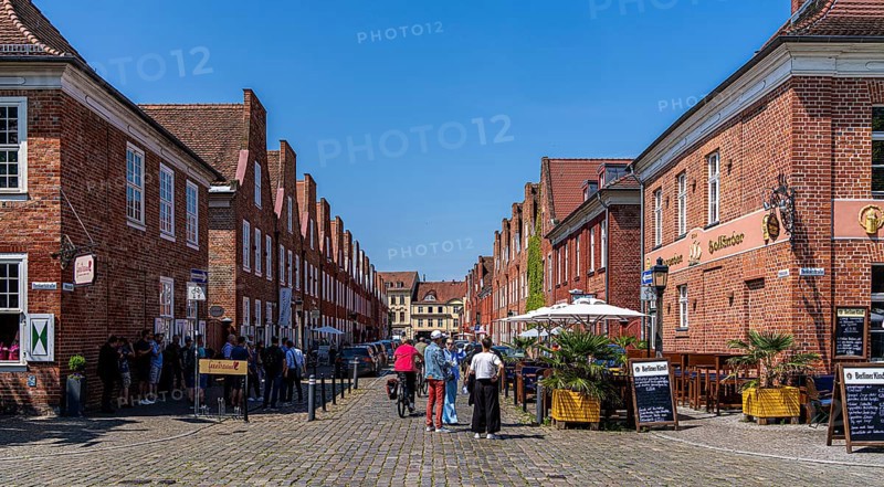 Catering, retail and typical, historic architecture in the Dutch Quarter in Potsdam, Brandenburg, Germany