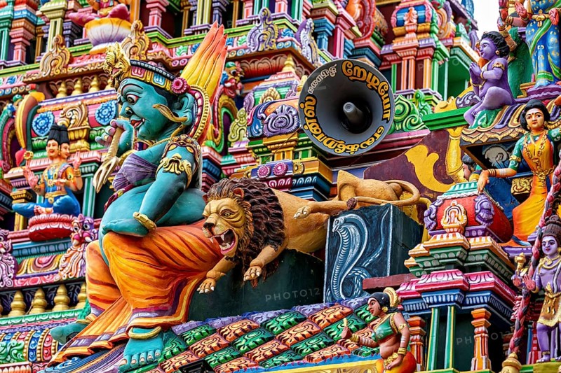 A lively temple front with colorful sculptures and mythological representations, The Sri Pathrakali Amman Trincomalee in Sri Lanka