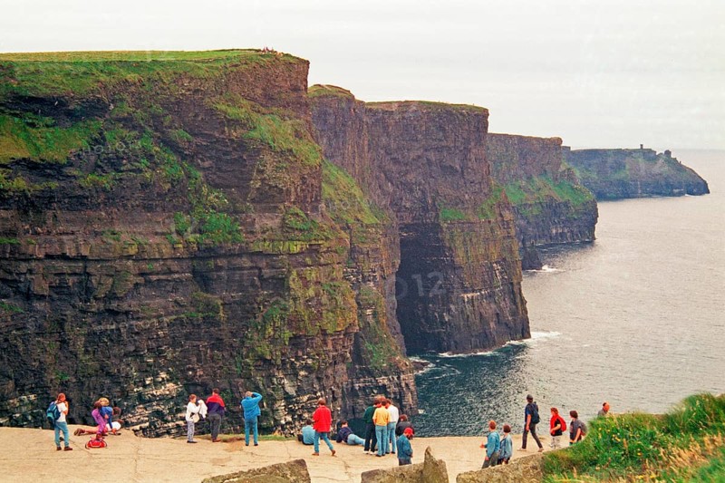 People on the cliff edge, there was no fence back then, Cliffs of Moher, County Clare, Republic of Ireland, July 21, 1993, vintage, retro, old, historic