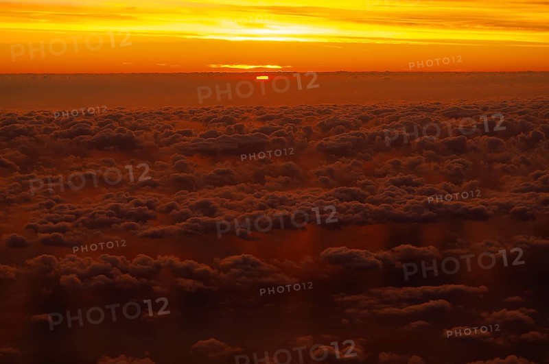 View from airplane window at sunrise