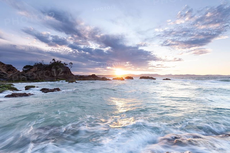 Sunset at Fisherman's Lookout. Dramatic waves and coastal scenery at The Pass, New South Wales, Australia