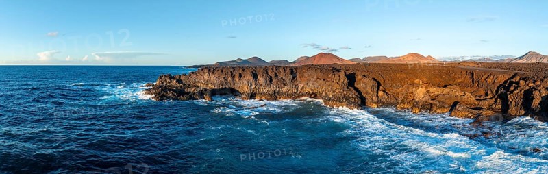 Coast with lava fields, volcanic landscape near Los Hervideros, in the evening light, aerial view, Lanzarote, Canary Islands, Spain