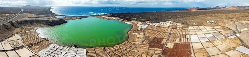 Salt mining plant, Salinas de Janubio with green Laguna de Janubio, near Yaiza, aerial view, Lanzarote, Canary Islands, Spain