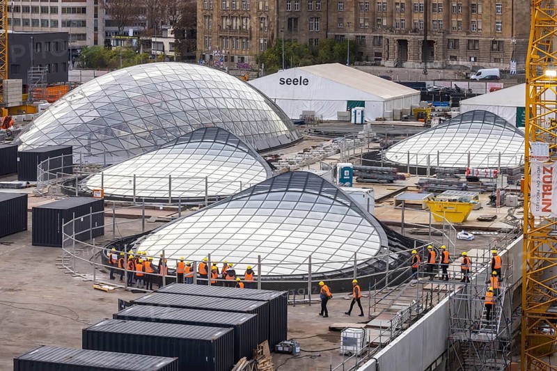 Stuttgart Central Station. Stuttgart 21 construction site. The new transit station is being built here. Light eyes on the roof of the new train station. Bonatz building. Construction site tour with a group of visitors. Stuttgart, Baden-Württemberg, Germany