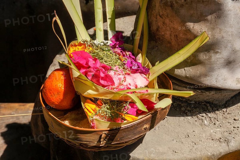 Canang Sari is a Balinese offering that expresses Wasa (God) or the creators of life to Sang Hyang Widhi. The offerings are used to balance and maintain peace on earth, between good and evil, between gods and demons, between heaven and hell, Kuta beach, Bali, Indonesia