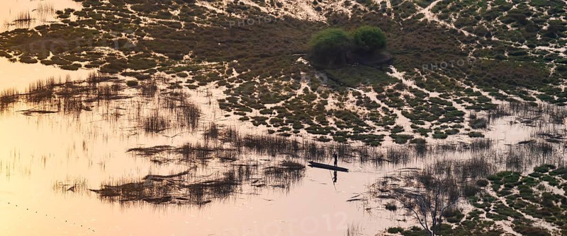 Marshland, marshland, Kavango fishermen with dugout boat, Mokoro, aerial view, Okavango Delta, Botswana