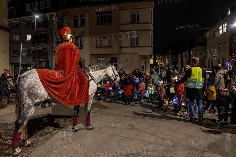 Martinszug in Essen-Rüttenscheid, the parish of St. Lambertus, Saint Martin actor on a horse, with over 500 participants, North Rhine-Westphalia, Germany