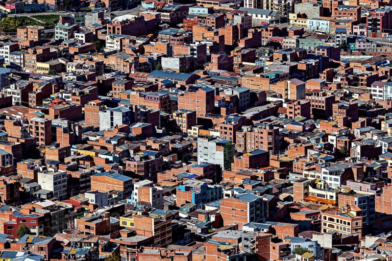 Narrowly built, dense city view with predominant brick buildings, the city of La Paz in Bolivia