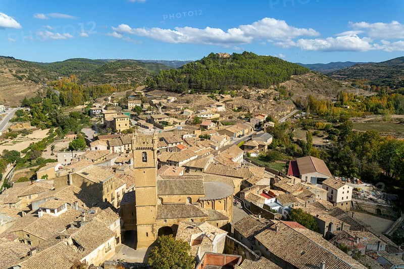 Church tower and rooftops of medieval village of Uncastillo, Cinco Villas, Zaragoza province, Aragon, Spain