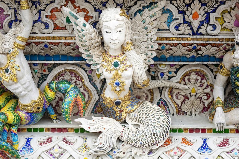 Decorative elements with pop culture references (for example comics, superheroes) in the stucco and porcelain vases outside and inside the art hall with modern art trends such as minimalism and abstraction, Wat Pariwat, Yan Nawa district, Bangkok, Thailand