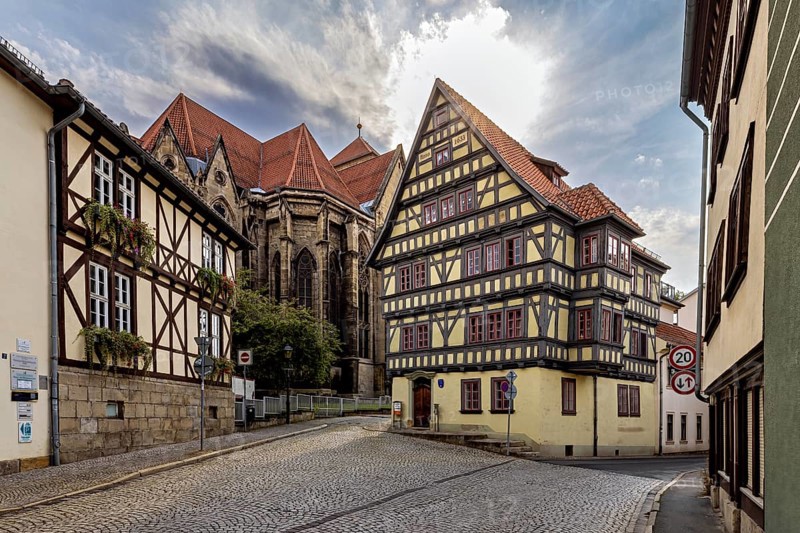 Half-timbered houses in a historic old town in sunshine and cobblestone streets, The old town of Arnstadt in Thuringia