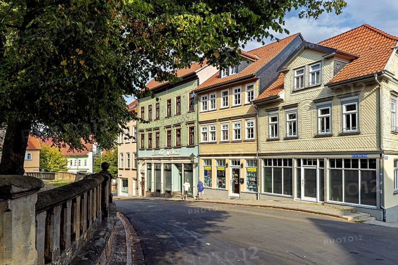 Street view with old buildings and trees in the city center in summer weather, The old town of Arnstadt in Thuringia