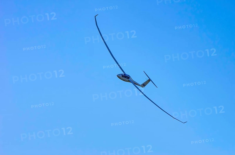 A Schempp-Hirth Arcus E motor glider, registration D-KWKU, during a screening as part of an air show at the Fliegerbergfest of the Rossfeld Luftsportverein in Metzingen-Glems, Baden-Württemberg, Germany, for editorial use only