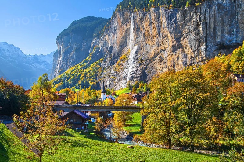 View of town and valley with Staubbach waterfall in autumn, Lauterbrunnen, Bernese Oberland, Canton of Bern, Switzerland