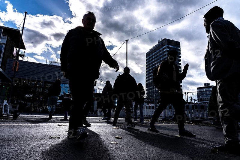 Passers-by in downtown Essen at the main train station, North Rhine-Westphalia, Germany