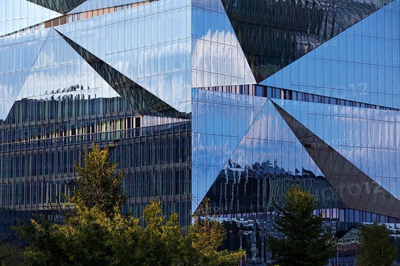 Cube Berlin, cube-shaped office building with folded glass façade reflecting the surroundings, detail, Washingtonplatz, Berlin, Germany