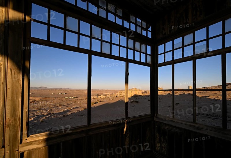 View from a former dwelling house into the desert, Kolmanskop, restricted diamond area, Karas region, Namibia