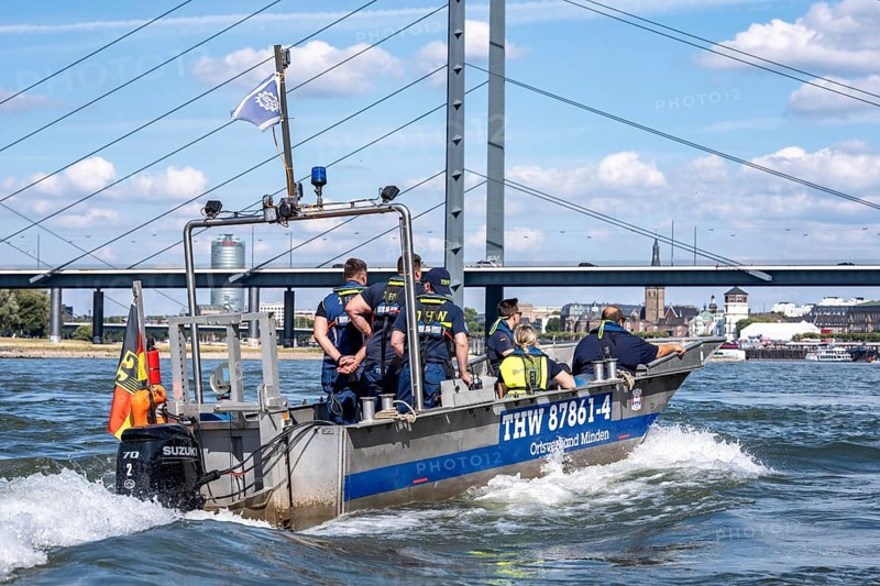 Multi-purpose boat of the THW during a training trip on the Rhine near Düsseldorf, the specialist group for water hazards, this type of boat is used to transport people and goods as a rescue boat and as a working platform, during the major exercise FÜLEX25, lasting several days, of the THW, Technical Relief Organisation, North Rhine-Westphalia regional association, over 3500 volunteers from the 127 North Rhine-Westphalia local associations practise many different deployment scenarios over 4 weekends