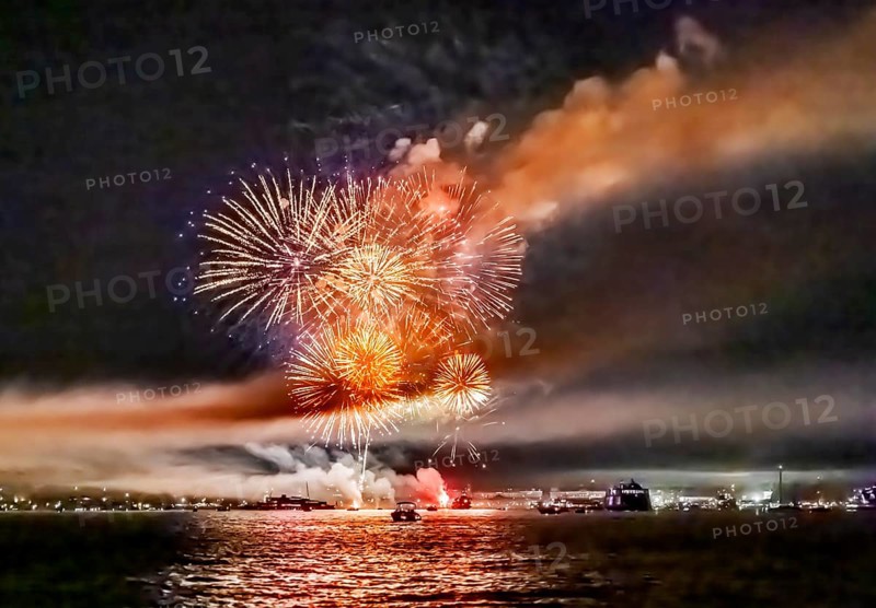 Lake Night Festival Constance. Water fireworks over the German shore and the neighbouring Swiss town of Kreuzlingen. View of the fireworks from Lake Constance. Constance, Baden-Württemberg, Germany