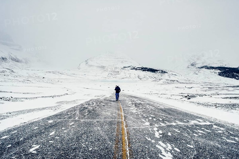 Winter road trip on the Icefields Parkway with lots of snow and ice, Banff National Park, Jasper National Park, Alberta, Canada