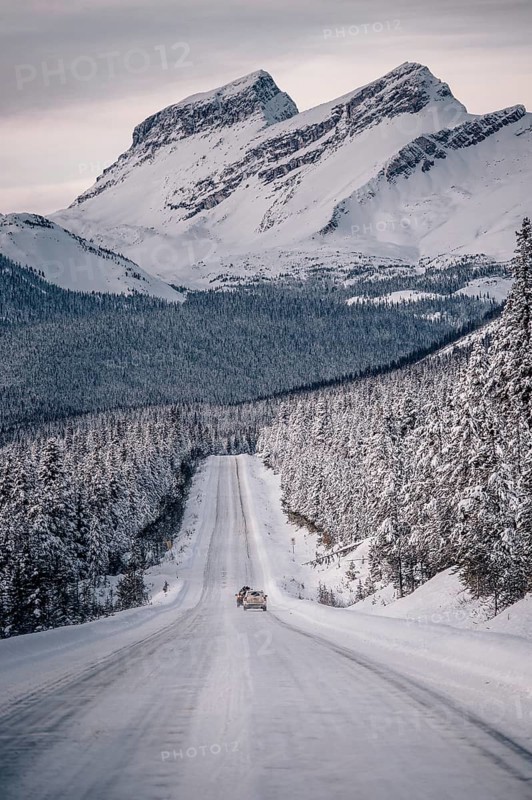 Winter road trip on the Icefields Parkway with lots of snow and ice, Banff National Park, Jasper National Park, Alberta, Canada