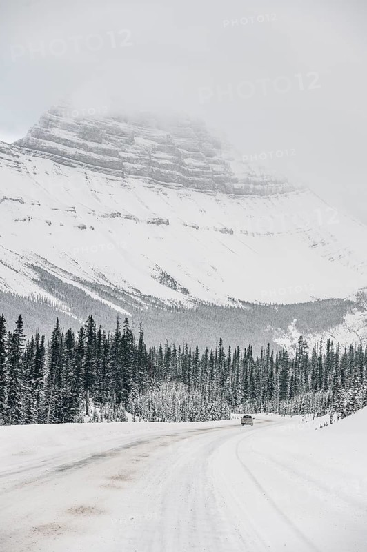 Winter road trip on the Icefields Parkway with lots of snow and ice, Banff National Park, Jasper National Park, Alberta, Canada