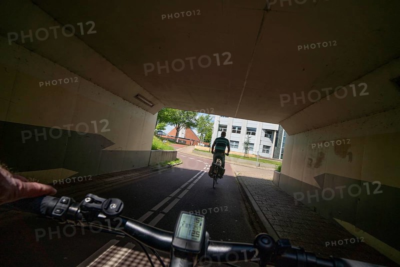 Roundabout in the Dutch city of Houten, the lanes for cars and bicycles are separated, the cycle path runs under the car lane, through subways, so that cyclists and cars can pass the intersection separately, in Houten, bicycle traffic has priority, considered a model city for modern bicycle traffic, Netherlands