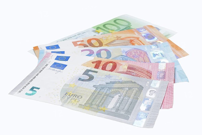 Various euro banknotes on white background, 5 euro, 10 euro, 20 euro, 50 euro, 100 euro