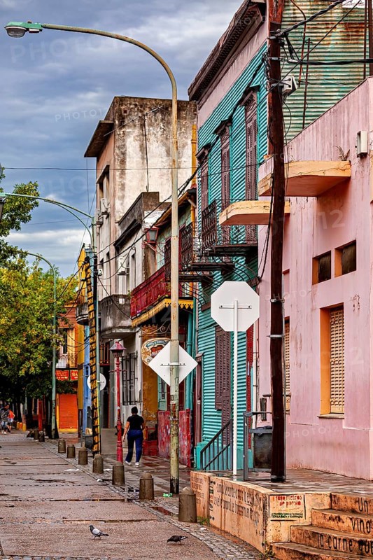 Street with old, colour-faded buildings and a quiet environment, The colourful city and tango district La Bocca in Buenos Aires Argentina