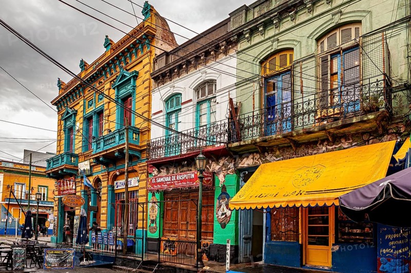 Classic colourful facade of buildings along an urban street, The colourful city and tango district La Bocca in Buenos Aires Argentina