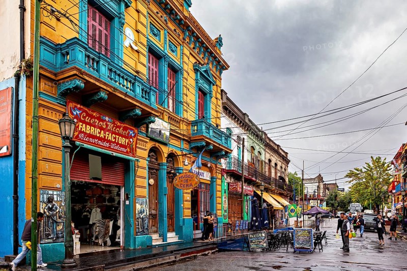 Traditional colourful facade of a shop on an empty city street, The colourful city and tango district La Bocca in Buenos Aires Argentina