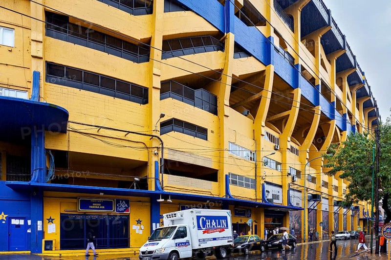 Yellow and blue stadium building on a rainy street, The football stadium of La Bocca of Bocca Juniors in Buenos Aires Argentina