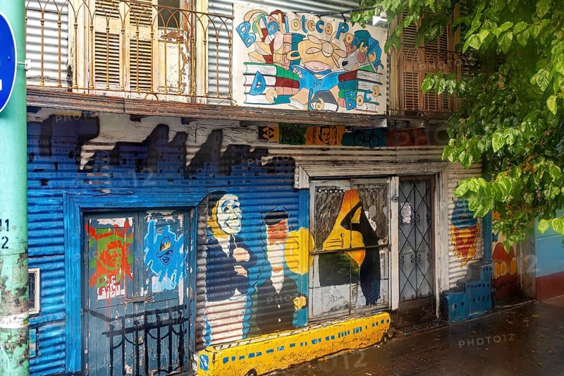 Creative street art on a colourful wall with different colours and motifs, the colourful city and tango district of La Bocca in Buenos Aires Argentina