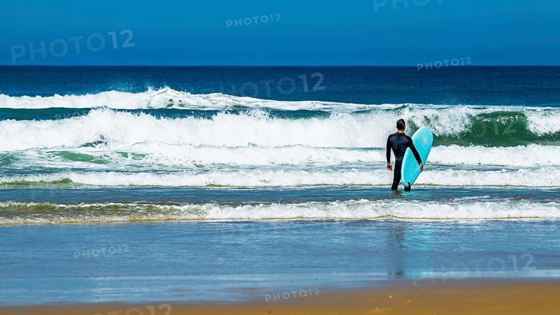 Surfer on Contis beach, Saint Julien en Born, Saint-Julien-en-Born, Landes, France