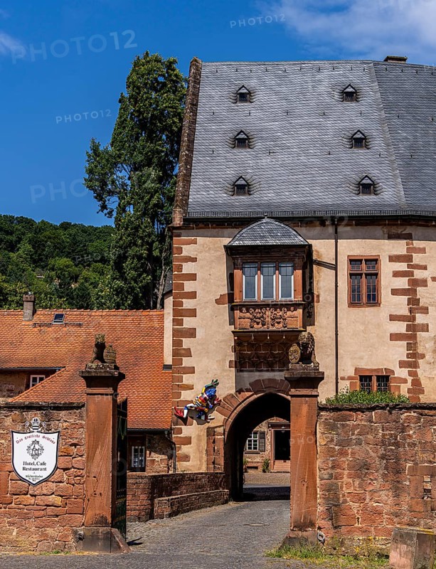 The old castle with Barbarossaplatz and the castle café in the old town centre of Büdingen, Hesse, Germany