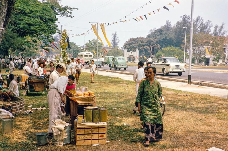 People celebrating having picnics, Waterfront, Johor Bahru, Malaysia, Southeast Asia 1963 - Mawlid festival commemorating the birthday of Islamic prophet Muhammad