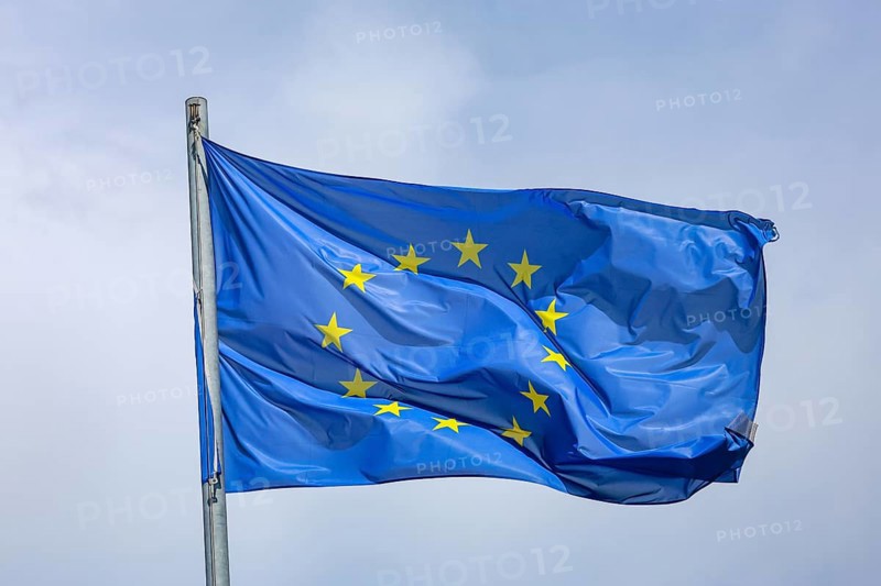 Düsseldorf, North Rhine-Westphalia, Germany - European flag fluttering in the wind on the flagpole, symbolic image of EUROPA