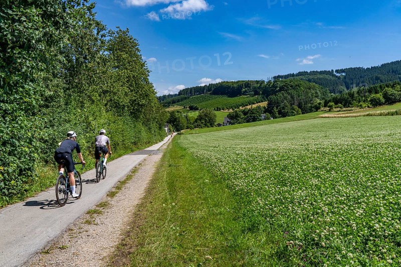 Sauerlandring cycle path, an 84 km long circular cycle path between the towns of Finnentrop, Eslohe, Schmallenberg and Lennestadt, mostly on former railway lines, here near Finnentrop-Serkenrode, Sauerland, North Rhine-Westphalia, Germany