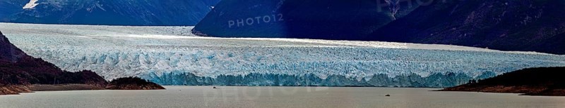 Impressive panorama of a vast landscape with a large glacier above a lake, The Perito Moreno glacier in Argentina