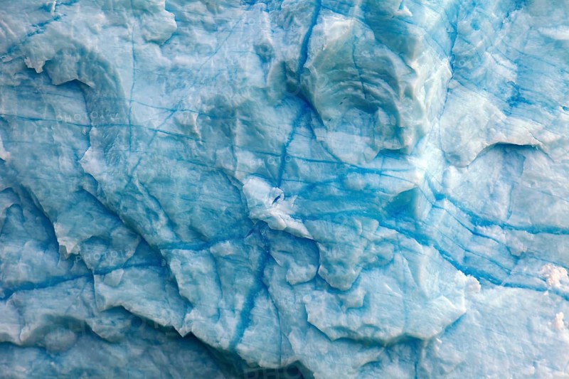 Close-up of the structured ice surface with blue cracks, The blue ice of the Perito Moreno Glacier in Patagonia Argentina