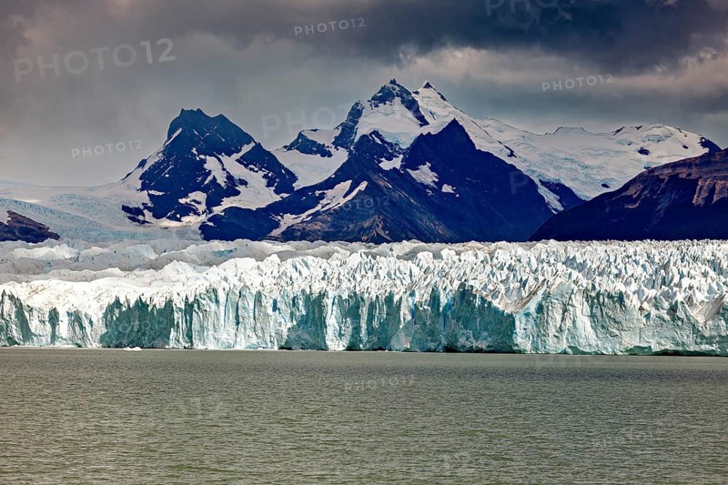 Majestic sight of mountains and glaciers under a gloomy sky, The Perito Moreno glacier in Argentina