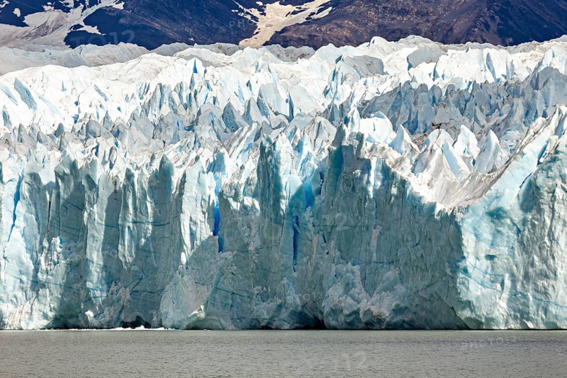 Impressive detail of a glacier with striking blue texture and structures, The Perito Moreno glacier in Argentina