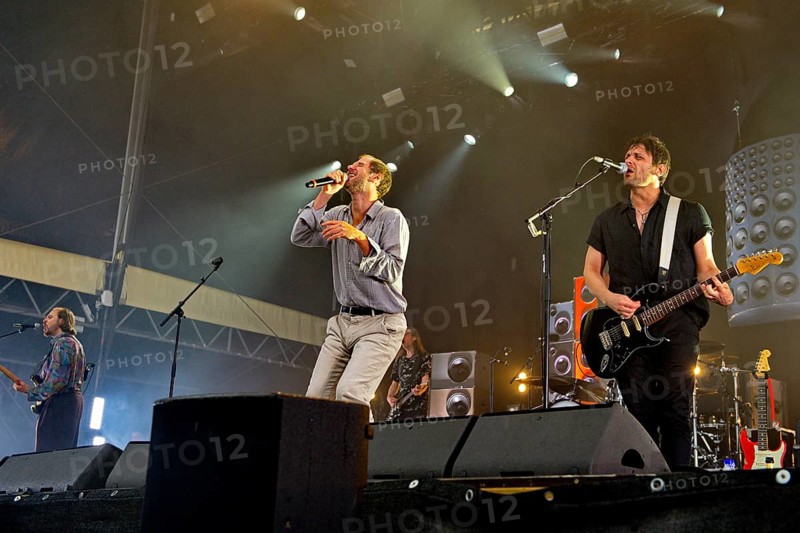 Marco Michael Wanda, singer, Manuel Christoph Poppe, guitarist, Reinhold Weber, bassist, from WANDA live on SCHÖN BEI DIR LIVE 2025-Tour at the Berlin Zitadelle on 12 July 2025