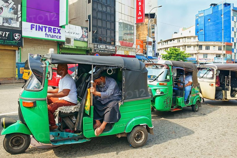 Motorized tuk tuk in a shopping street, Colombo, Sri Lanka