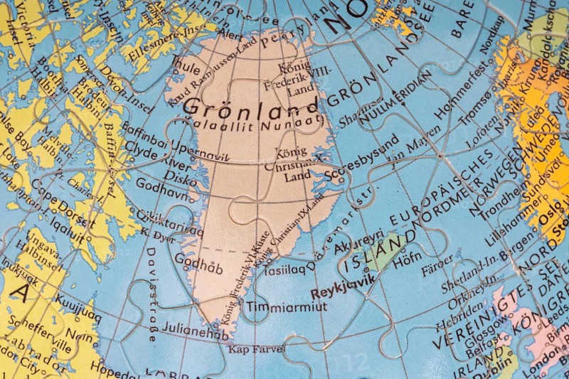 Puzzle globe. Map made from puzzle pieces. Greenland and Denmark