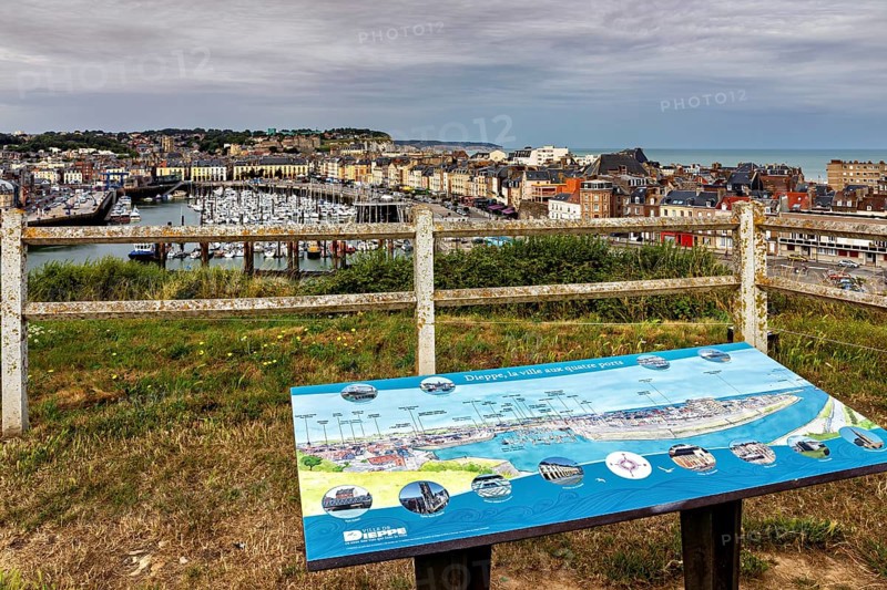 View from a viewpoint with information sign over a harbour and the coast, The harbour of Dieppe in Normandy, France