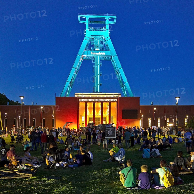 People in front of the German Mining Museum for the Extra Shift at night, Bochum, Ruhr Area, North Rhine-Westphalia, Germany
