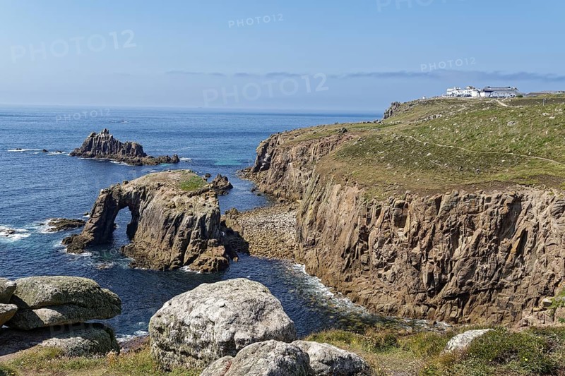 Rock formation and rock gate off the west coast of England in the Atlantic Ocean. Land's End, the tip of the headland in the west of Cornwall, is the most westerly point in England. Land's End, Sennen, Penzance, Cornwall, South West England, Great Britain