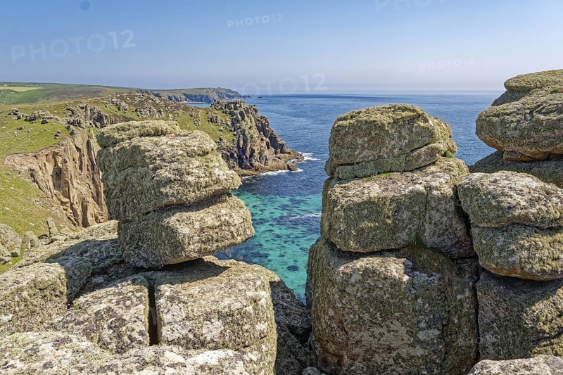 Rock formation off the west coast of England on the Atlantic Ocean. Land's End, the tip of the headland in the west of Cornwall, is the most westerly point in England. Land's End, Sennen, Penzance, Cornwall, South West England, Great Britain