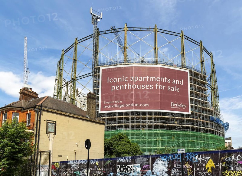 Construction project new apartments The Halo development inside Victorian gasometer, Oval Village by Berkeley, Vauxhall, Lambeth, London, England, UK